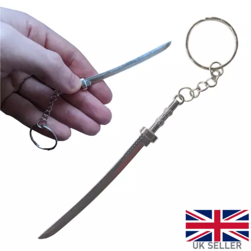 Miniature samurai sword keyring gift set on white background